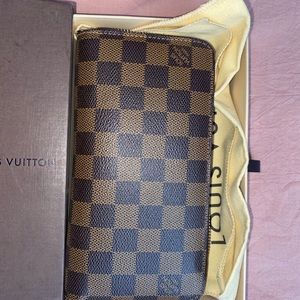 Louise vuttion wallet!